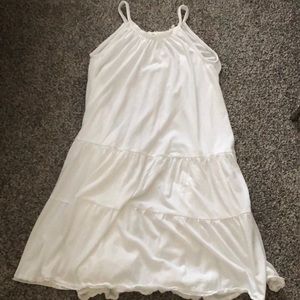 This is a beautiful white beachy flowy dress